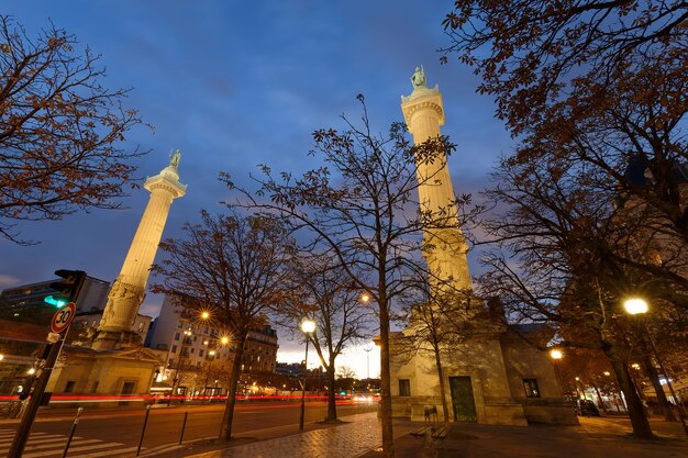 The two Doric columns erected in 1788 on Trone Avenue frame the entrance to Cours de Vincennes and Place de la Nation Paris