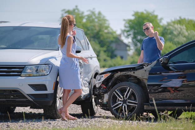 Two drivers having argument over who is guilty in car crash accident Road safety and insurance concept