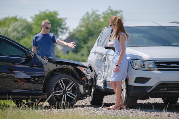 Two drivers having argument over who is guilty in car crash accident Road safety and insurance concept