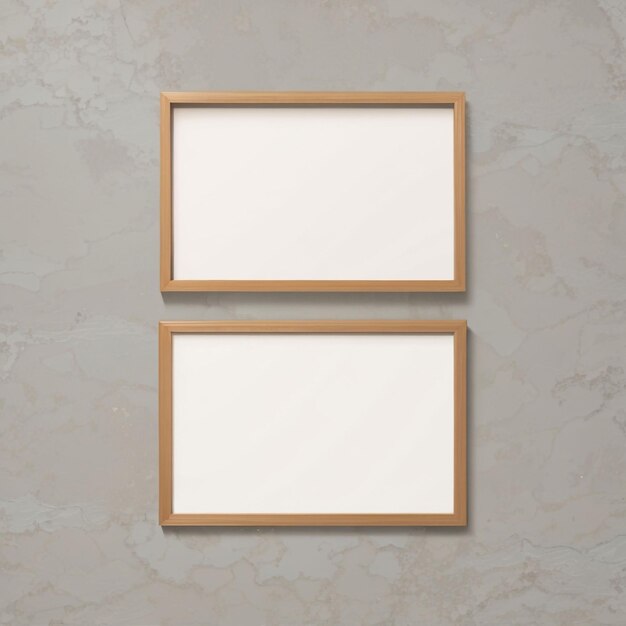 two empty picture frames hanging on a wall