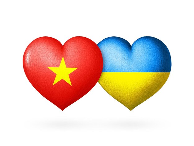 Two flags Flags of Ukraine and Vietnam Two hearts in the colors of the flags