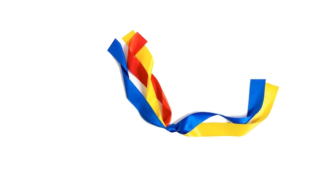 Two flags Romania and Ukraine tied to a knot on the white background The friendship and donation from Poland to Ukraine during the War