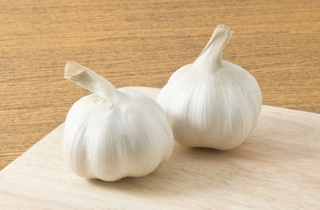 Two Fresh Organic Garlic Bulbs Used for Seasoning in Cooking.