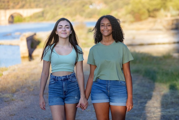 Two girls friends in the countryside