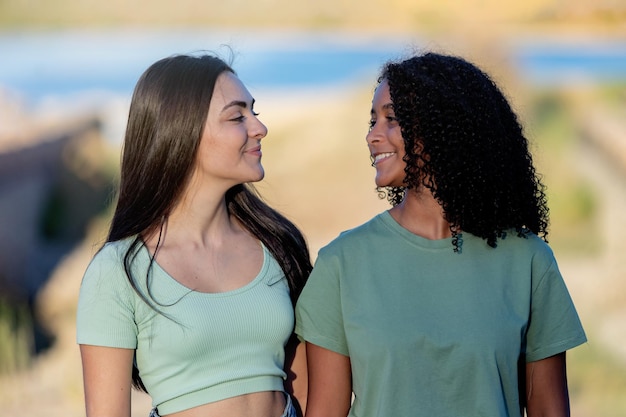 Two girls friends in the countryside