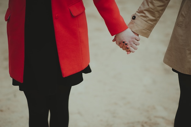 two girls holding hands