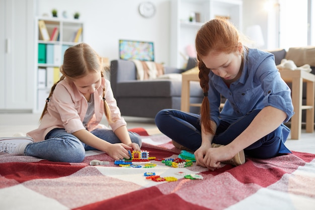 Two Girls Playing at Home