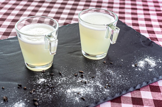 Two glass glasses with lemon sherbet