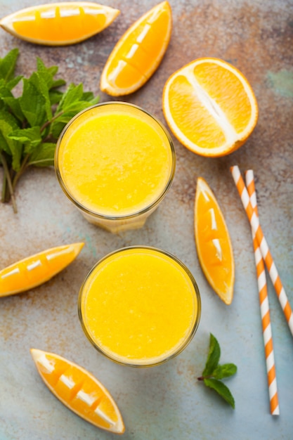 Two glasses of freshly squeezed orange juice.