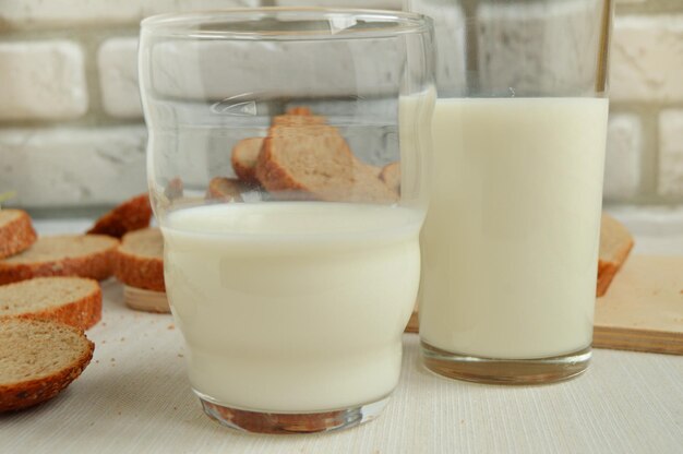 Two glasses of milk are on the table Breakfast for the family healthy eating concept world health day