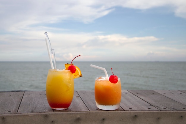 Two glasses of mocktail with ocean view