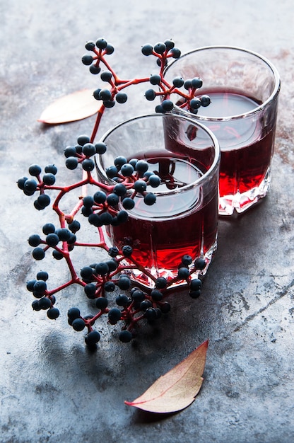 Two glasses of red drink 