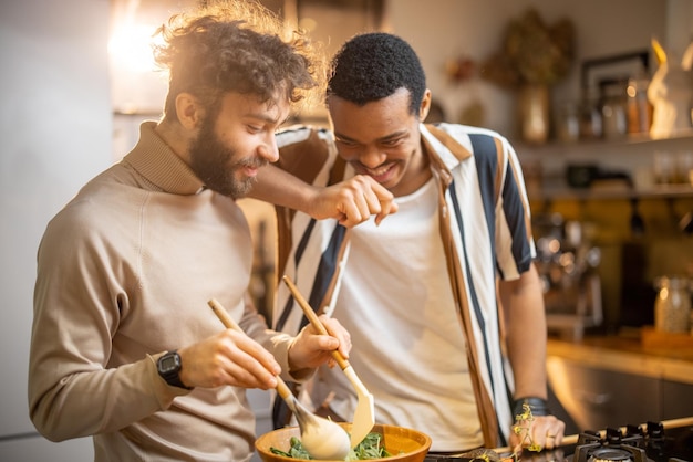 Two guys cooking healthy together at home