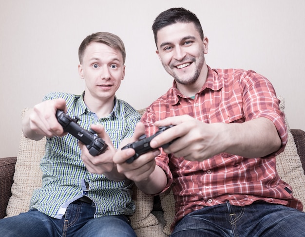 Two guys playing video games