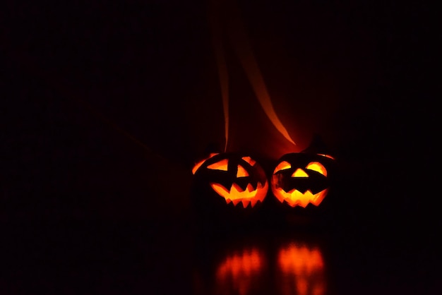 two halloween pumpkins jack o lantern glow in the dark