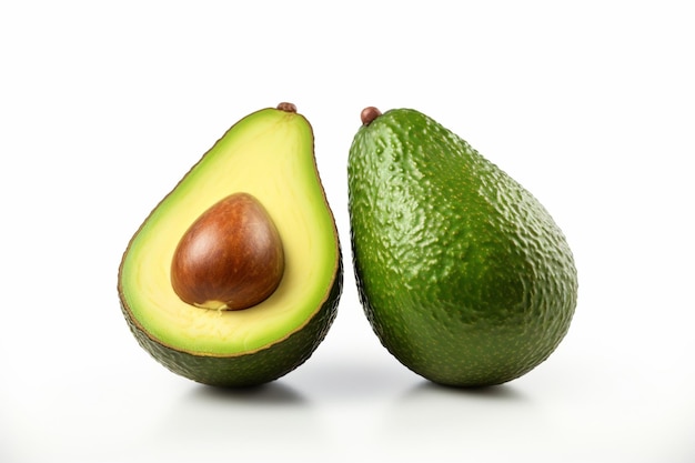 Two halves of fresh avocado isolated on white