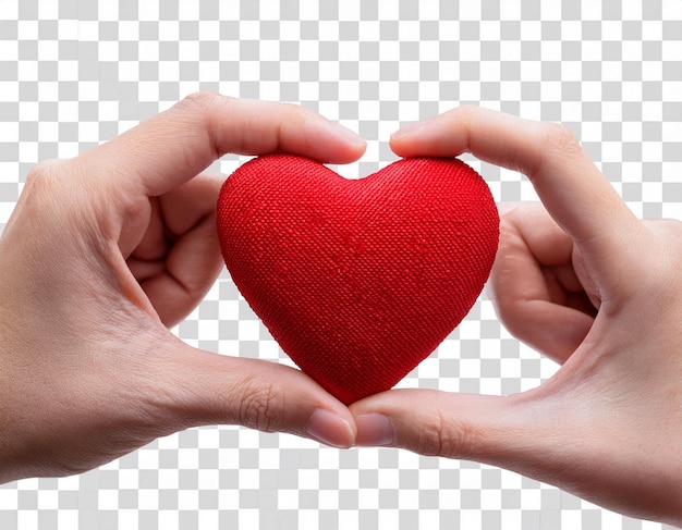 Photo two hands hold a heart with a red heart on a checkered background