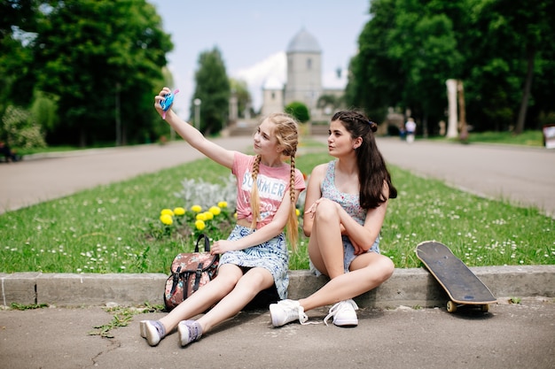 two happy girls modeling