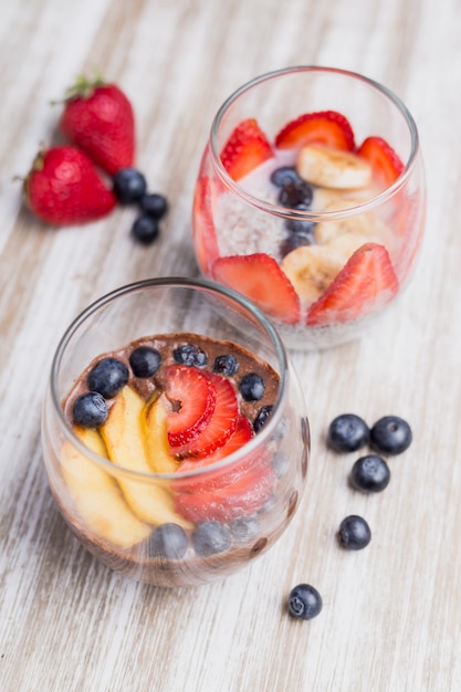 Two healthy fruit dessert strawberries and cranberries