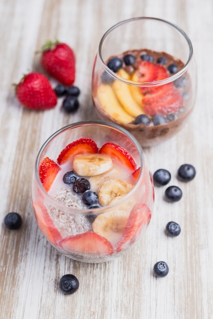 Two healthy fruit dessert strawberries and cranberries