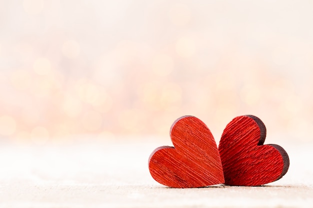 Two Hearts. Valentines day greeting card with bokeh background.