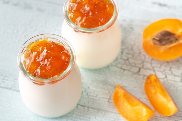 Two jars of Greek yogurt with apricot