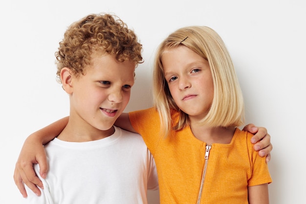 Two joyful children Friendship together posing emotions lifestyle unaltered