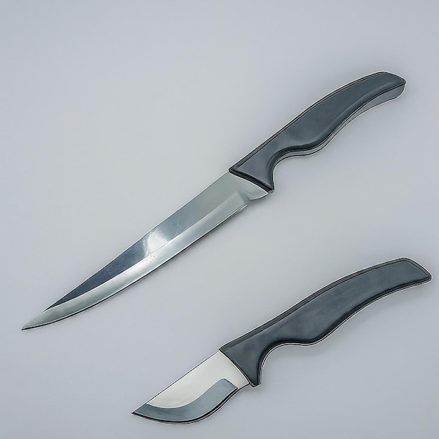 two knives of a knife are shown on a white surface