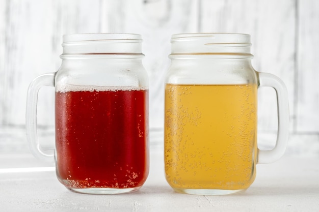 Two kombucha jars