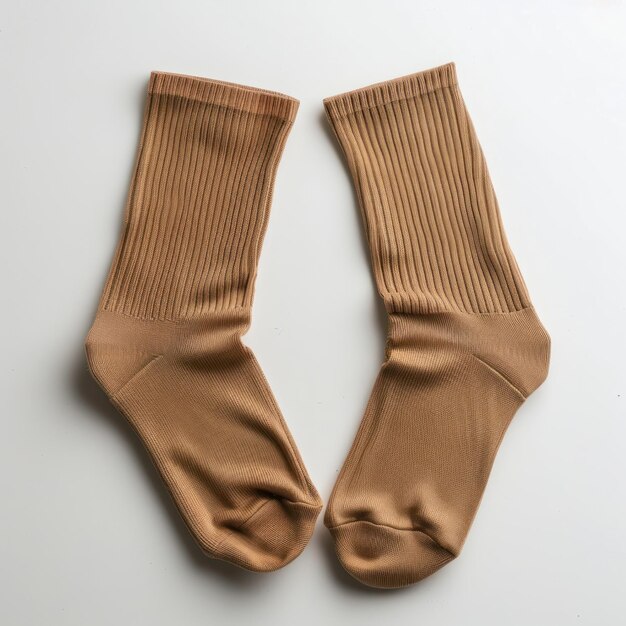 Two light brown socks clothing apparel hosiery