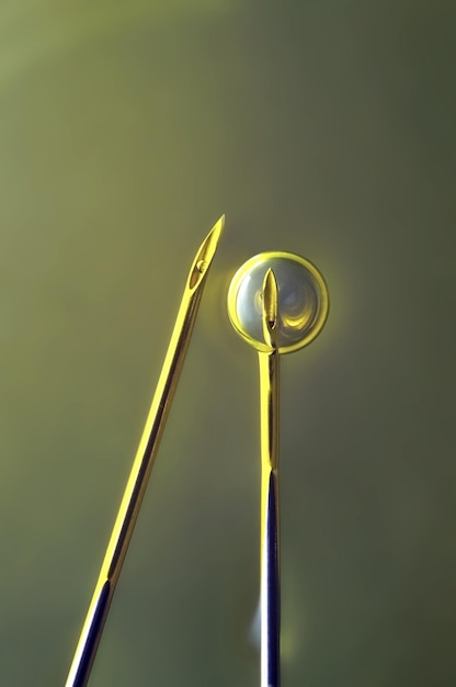 Two medical needles in a liquid through one of which a bladder is inflated macro