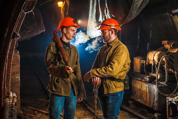 Two miners in the mine