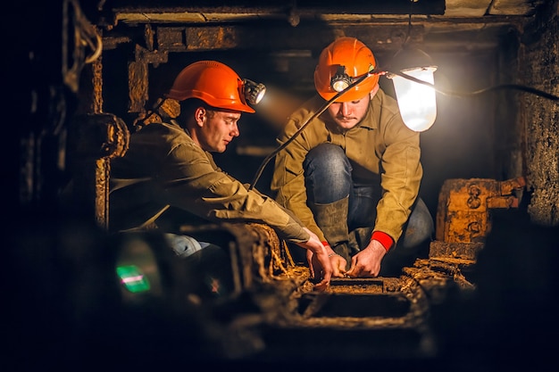 Two miners in the mine