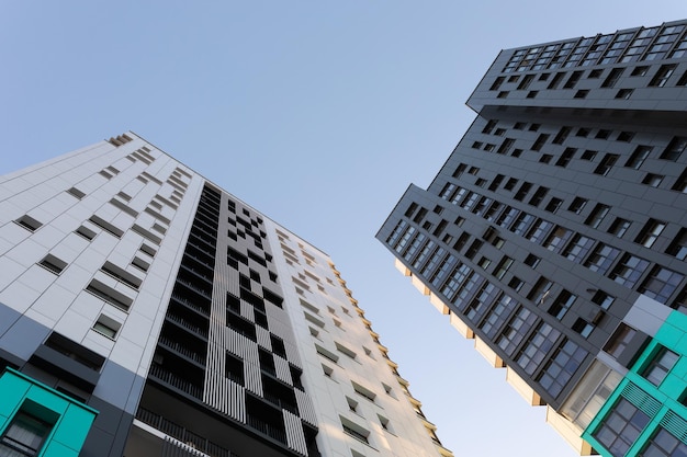 Two multistorey residential buildings bottom view