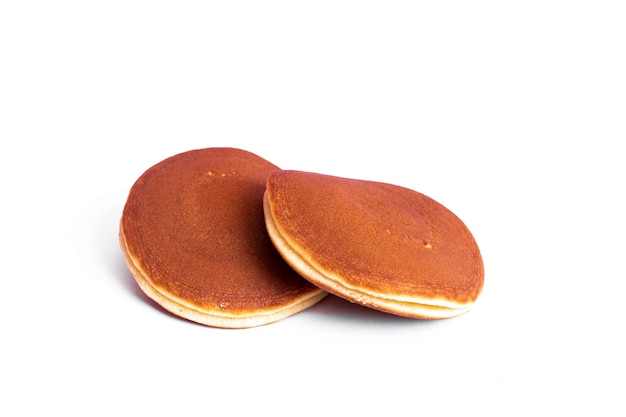 Two pancakes isolated on a white background