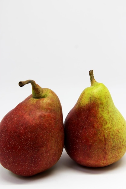 two pears one of which is red and green