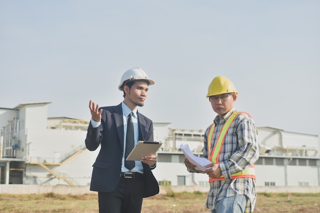 Two people businessman talking communication Architecture construction building project