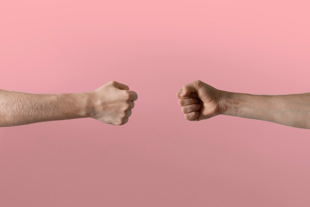 Two people make a fist bump friendship and relationship concept