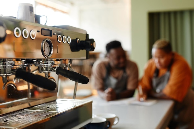 Two People Working In Cafe