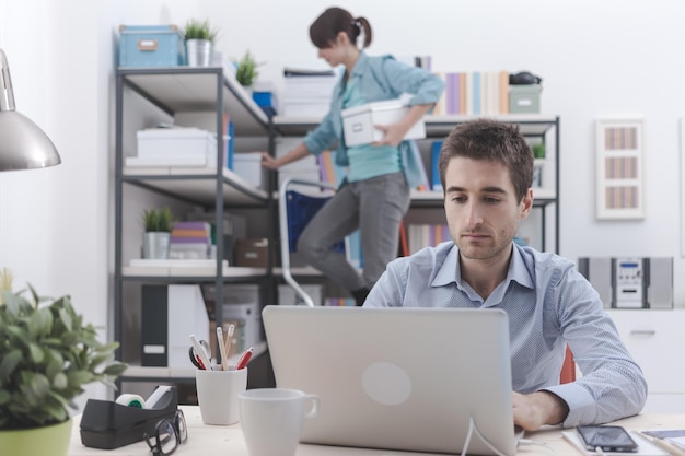 Two people working in the office