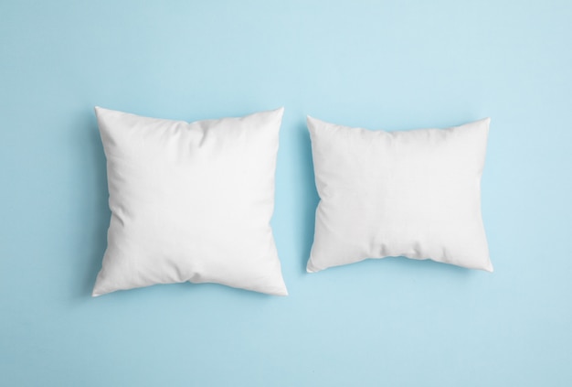 Two pillows on the blue background