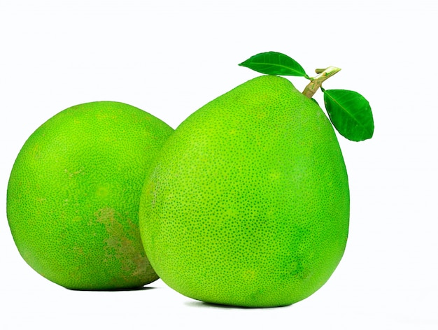 Two pomelo with leaves isolated. Tropical fruit. Citrus fruit.  Green fruit.