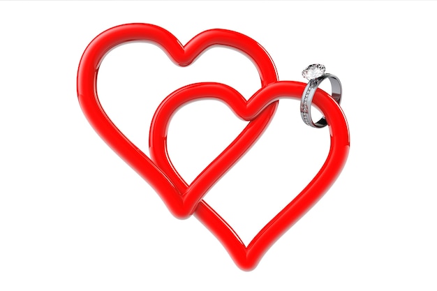 Two red hearts with diamond wedding ring on a white background