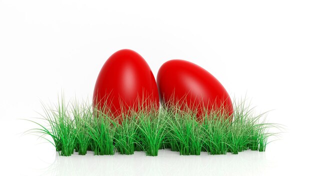 Two red painted Easter eggs with green grass isolated