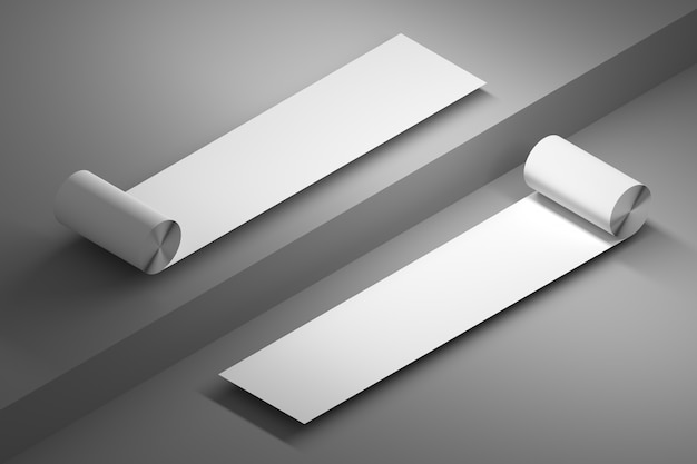 Two rolls of duct paper with blank empty surfaces over gray floor