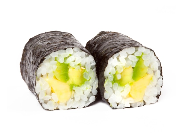 Two rolls with avocado and nori isolated on white background