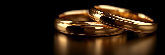 Photo two shiny gold wedding bands rest on a smooth surface evoking feelings of unity and eternal love in their warm glow