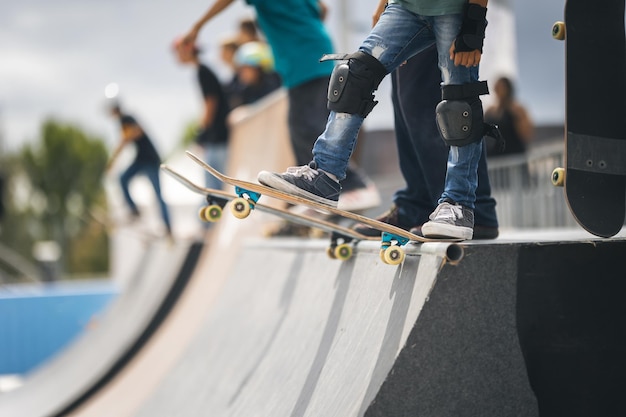 Two skateboarders performing tricks simultaneously