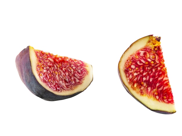 Two slices of purple fig isolated on white background with copy space soft sweet fruit skin is thin