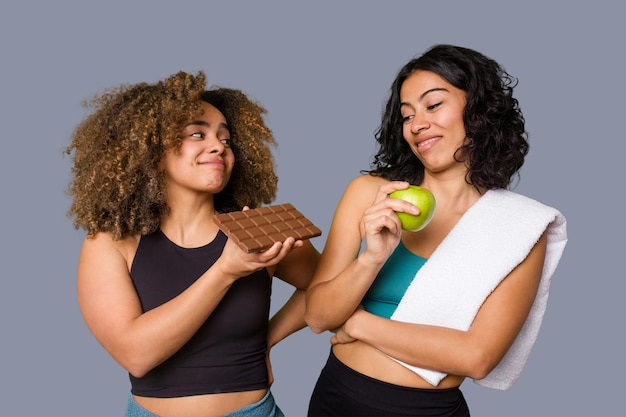 Two sporty friends strive for balance between their healthy eating and indulgent desires